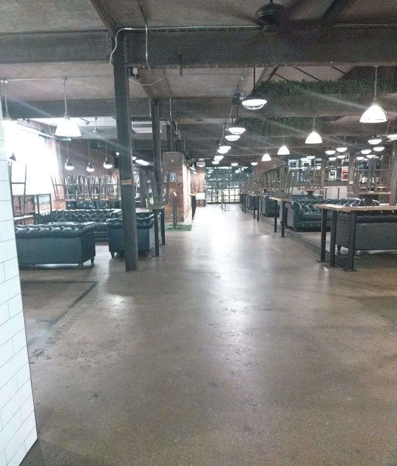 Event hall with polished concrete floors cleaned overnight by Maloon